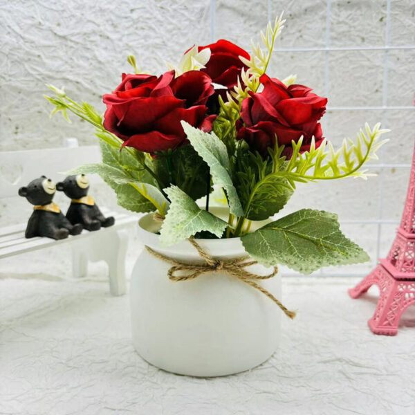 three roses potted plant red